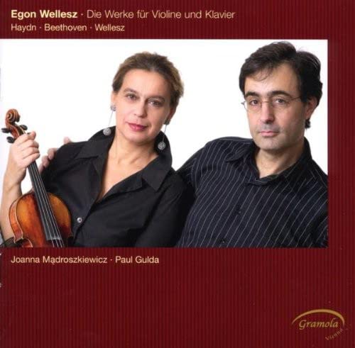 CD cover featuring portraits of a violinist and pianist, Joanna Madroszkiewicz and Paul Gulda.