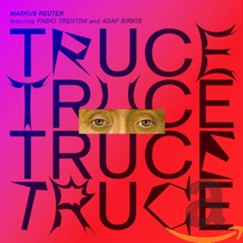 The image is a music album cover with a pair of eyes and bold text.