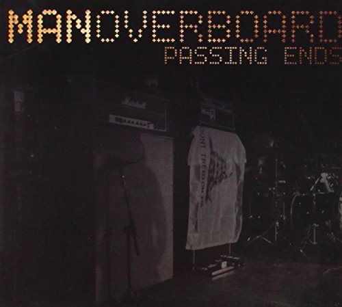 Album cover with "Man Overboard" in orange dots, dark background, and music equipment visible.