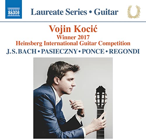 CD cover featuring guitarist Vojin Kocić in a blue suit.