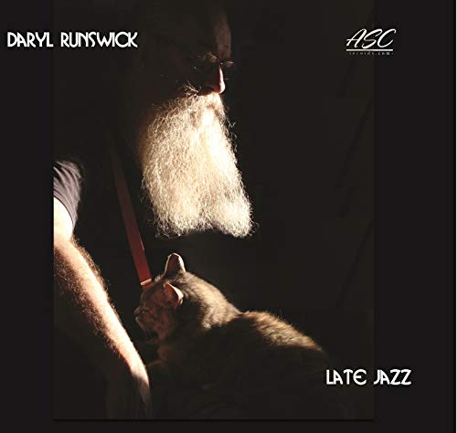 "CD cover with a man having a long white beard, holding a double bass."