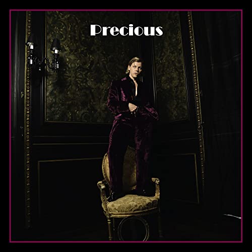 Album cover for Conrad Sewell's "Precious" featuring a person in purple velvet.