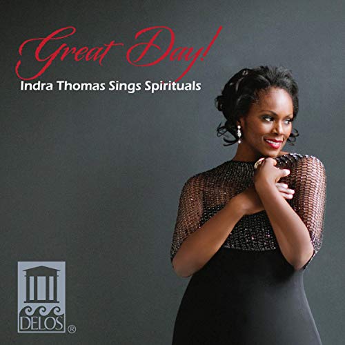 "Album cover featuring Indra Thomas in a black dress against a dark gray background."