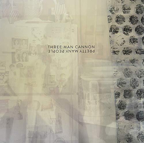 A vinyl album cover with a faded, layered collage and reversed text.