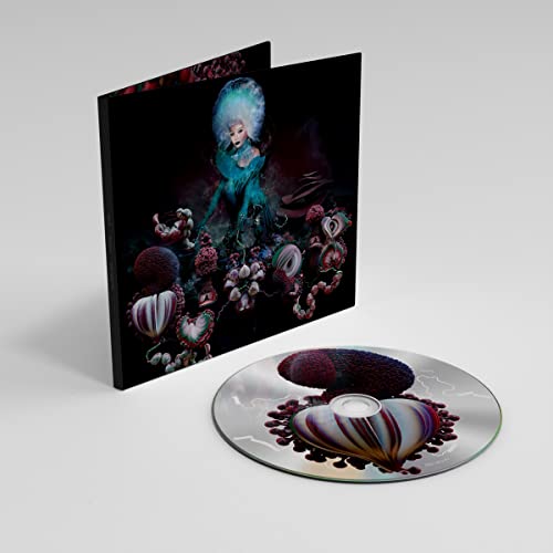 Björk’s “Fossora” CD case and disc with fantastical, fungal imagery.