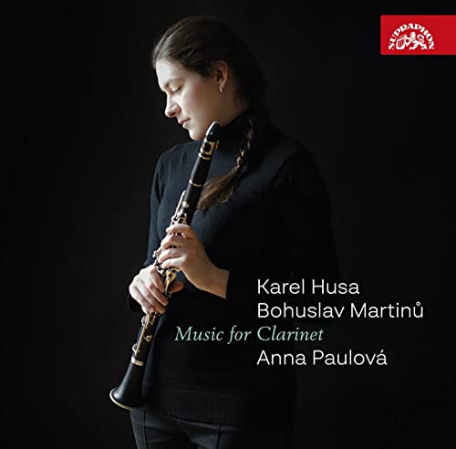 Woman playing clarinet, album cover for Karel Husa and Martinů music.