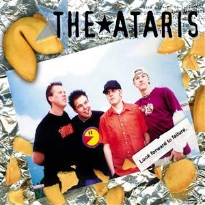 Vinyl record cover featuring a band with fortune cookie imagery.
