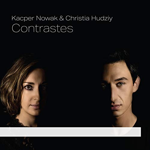 Album cover with a man and woman against a dark background.