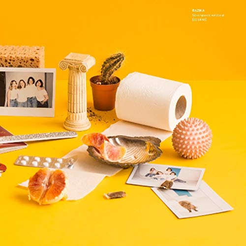 Album cover with eclectic objects on a yellow background, featuring photos and various items.