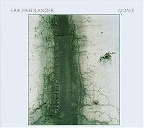 Album cover with cracked, damaged wall image, artist and title on white background.