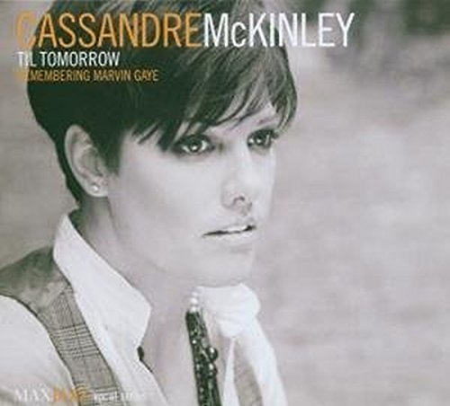 Black and white album cover featuring a woman holding a microphone.