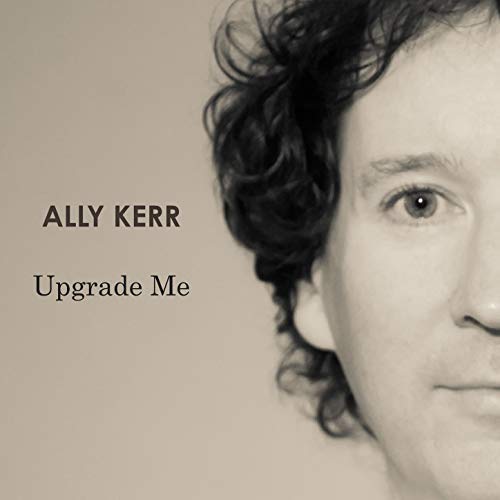 Black and white close-up of a woman's face with text "Ally Kerr Upgrade Me".