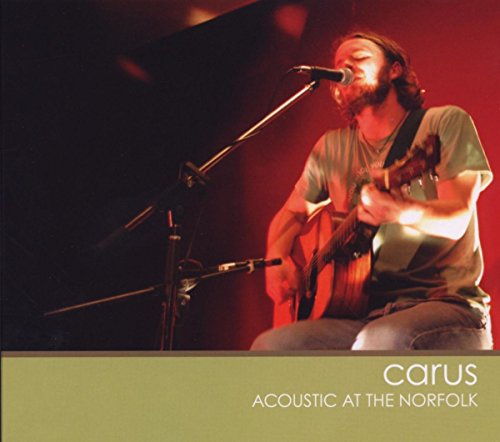 Album cover: man playing guitar and singing into a microphone, olive green banner below.
