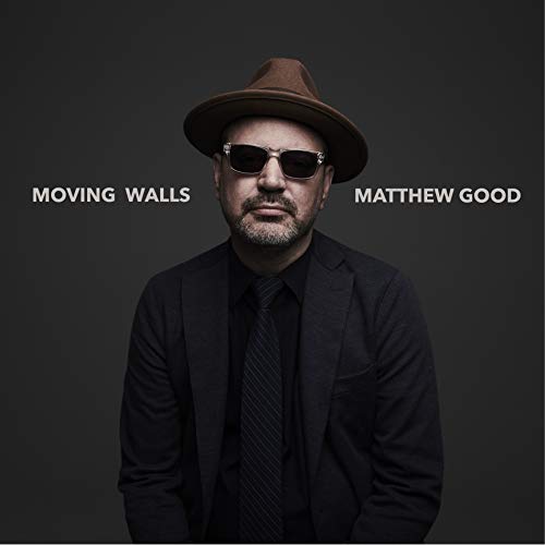 Matthew Good album cover: man in hat and sunglasses, dark background.