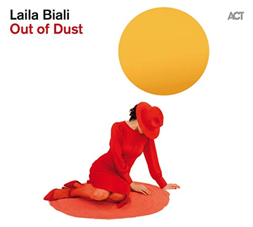 Album cover: woman in red dress and hat kneeling on red circle, yellow sun above.