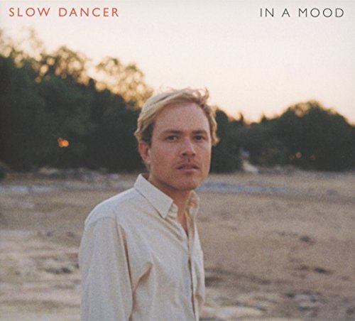 CD cover featuring a portrait of a man with blonde hair.