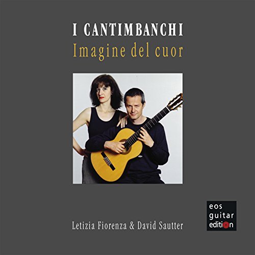 CD cover featuring a man and woman with a guitar on a gray background.