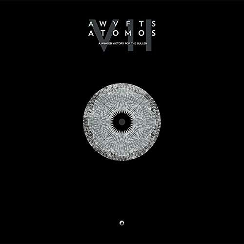 Black album cover with white geometric eye and text “Atomos VII”.
