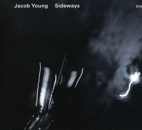 Album cover with black background, white abstract shapes, and text "Jacob Young Sideways ECM".