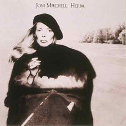 Joni Mitchell's 'Hejira' album cover, featuring a black-and-white image of Joni Mitchell walking on a road.