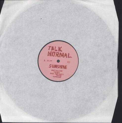 Vinyl record label for Talk Normal’s “Sunshine”, pink with black text.