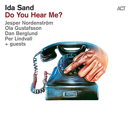 CD cover: hand dialing a vintage black rotary phone.