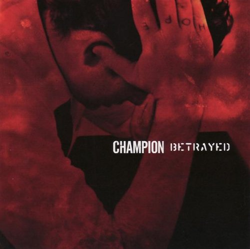 Red-toned album cover with a person’s face partially obscured by a hand.