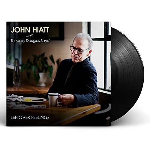 John Hiatt album cover with two black vinyl records beside it.