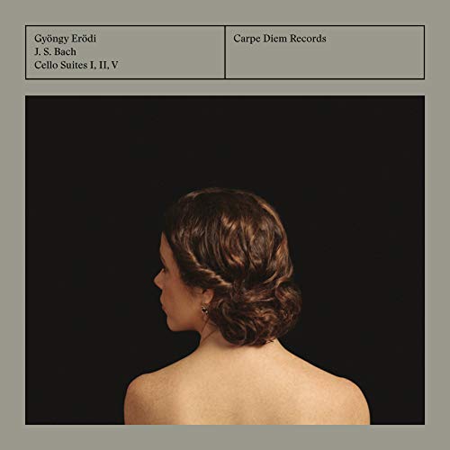CD cover with a woman's back and dark hair against a black background.