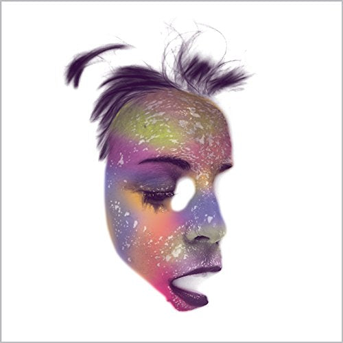 A multi-colored mask with a face design, splattered paint, and dark hair on a white background.
