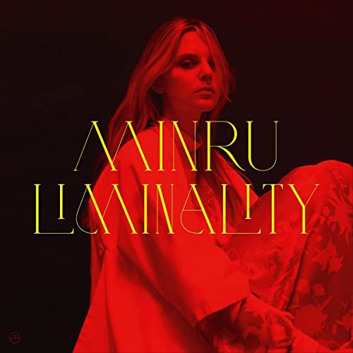 Album cover for Minru’s “Liminality” featuring a woman in red light.