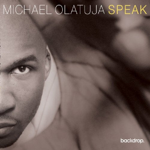 "Album cover with a black-and-white close-up of a man's face."