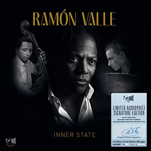 Album cover with a man and two musicians against a black background.