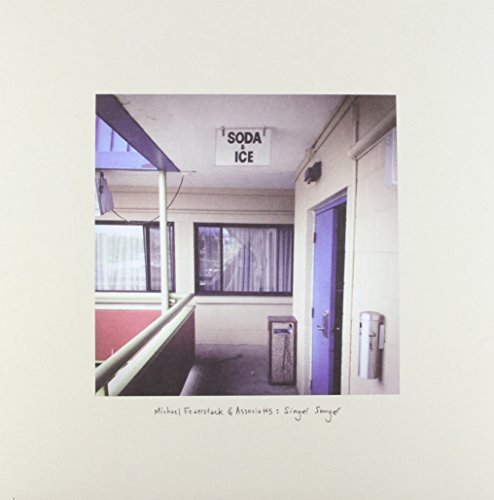 "Vinyl record cover featuring a faded photo of a dimly lit hallway with a 'Soda Ice' sign."