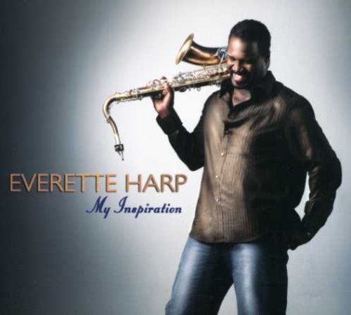 "Album cover featuring a man holding a saxophone, with artist and album name."