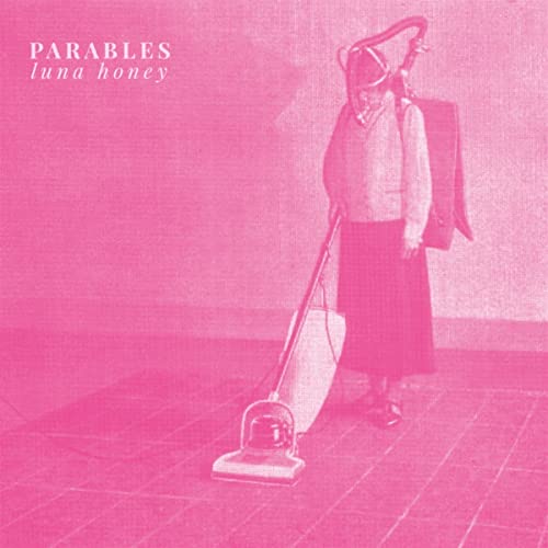 Pink album cover featuring a person with a vacuum cleaner.