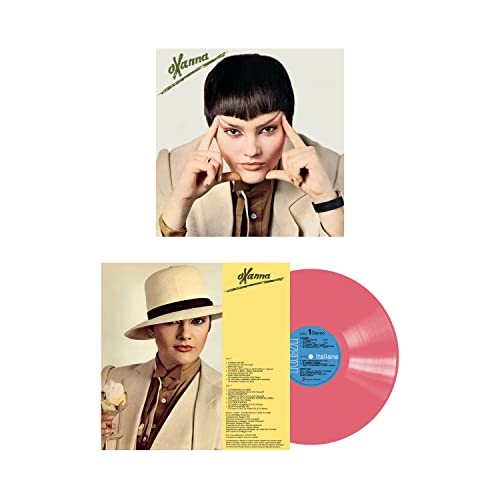 Pink vinyl record with album cover featuring a woman in a suit.