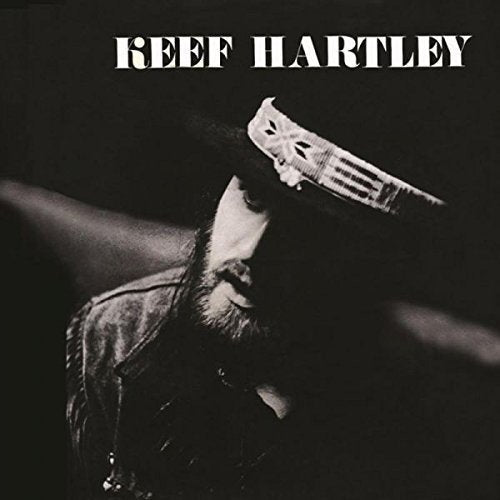 "CD cover with a black and white image of a man wearing a hat."