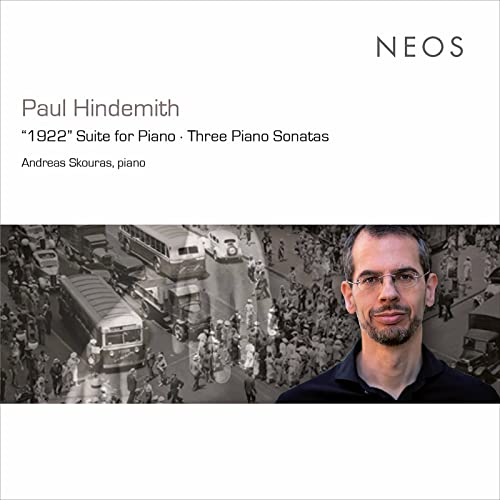 CD cover featuring pianist Andreas Skouras and a grayscale city scene.