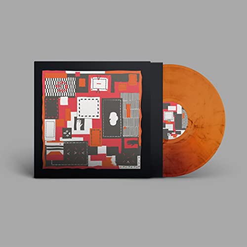 Vinyl record with orange disc and collage-style album cover.