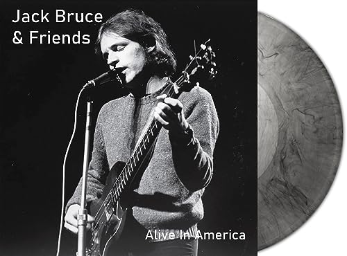 Jack Bruce album cover with a marbled vinyl record beside it.
