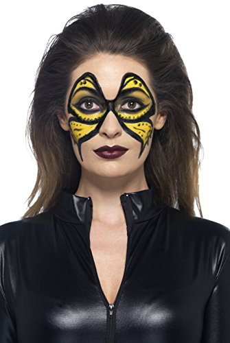"Woman with yellow and black face paint, wearing a black leather jacket."