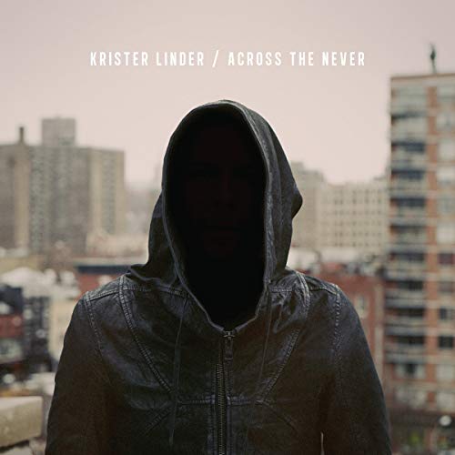 Hooded figure against a blurred urban cityscape, album cover art.