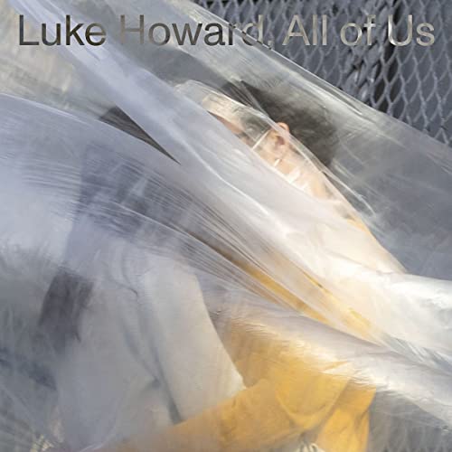 Vinyl record cover featuring a blurred portrait behind plastic wrap.