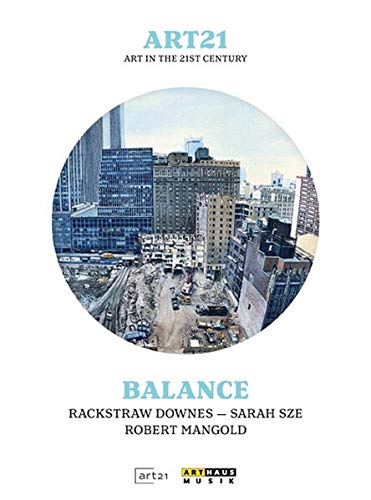 The image shows a DVD cover with a cityscape. "White DVD cover with cityscape image and blue and black text."