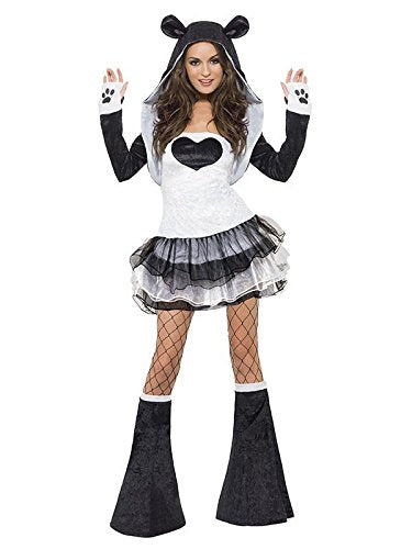 A woman wears a black and white panda costume with a tutu and knee-high boots.