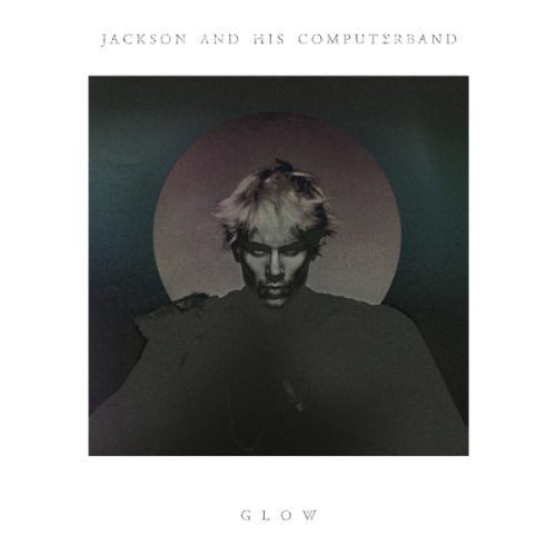 Album cover for "Glow" by Jackson And His Computerband, featuring a portrait.