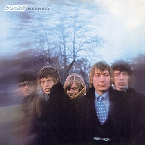 The Rolling Stones album cover, five men in coats, blurred background.