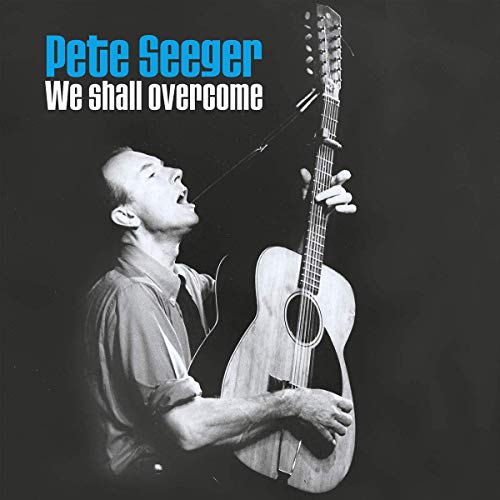 Pete Seeger playing guitar on the album cover "We Shall Overcome.