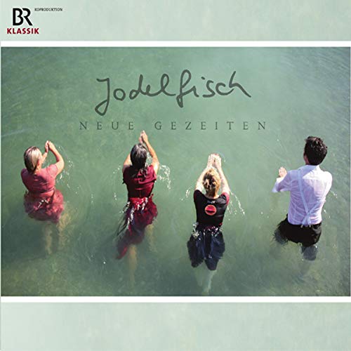 "CD cover featuring four people standing in water with hands raised, greenish background."